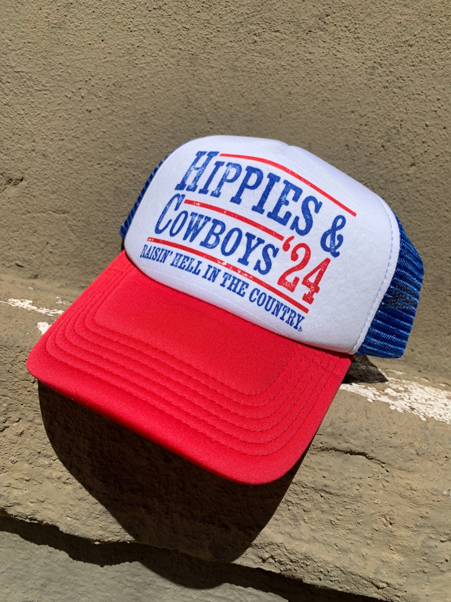 Hippies & Cowboys '24 red and blue foam trucker hat